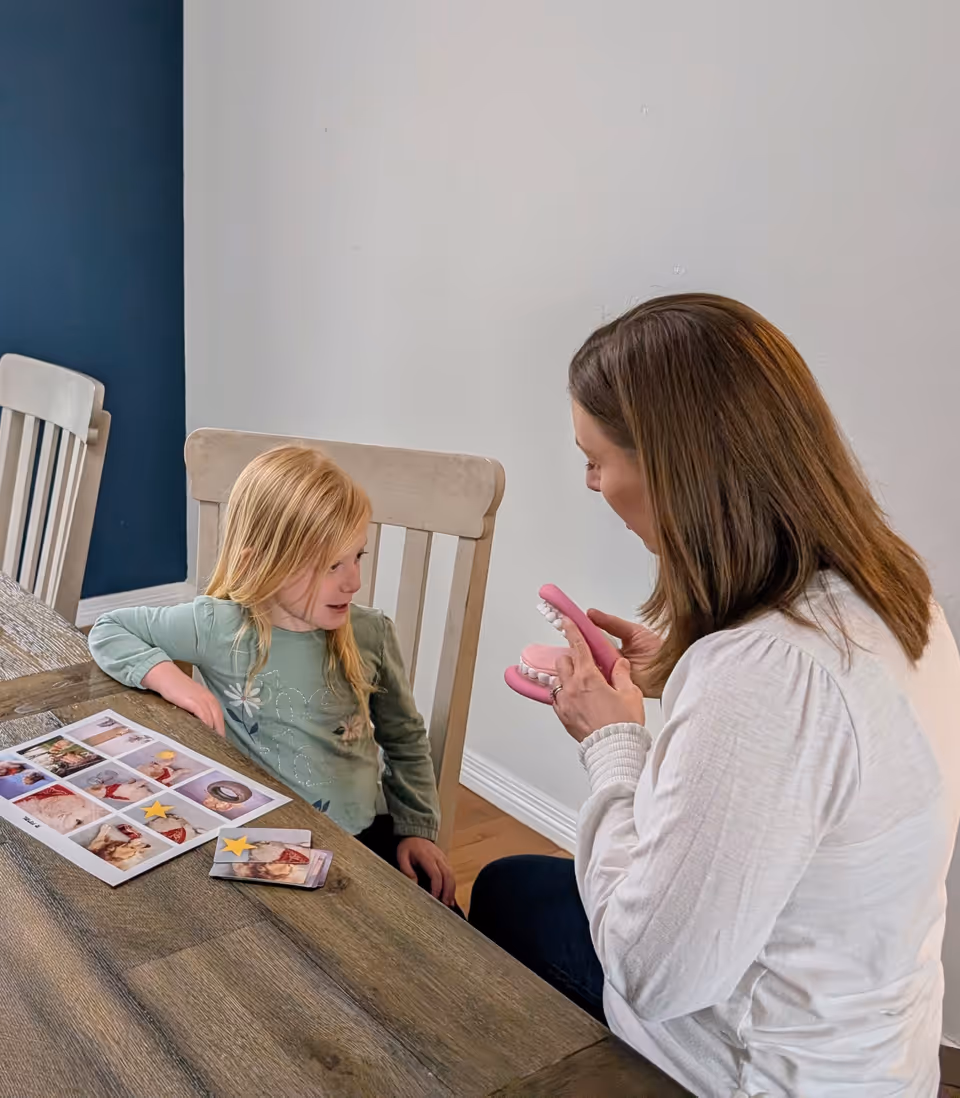 Rachel talking with child